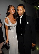 John Legend and Christine Teigen backstage at the 50th Annual Grammys