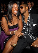 Usher & Tameka in the audience at the 50th Annual Grammys