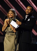 Fergie and John Legend present an award at the 50th Annual Grammys
