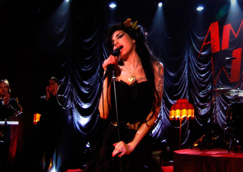 Amy Winehouse performs (via satellite) at the 50th Annual Grammys