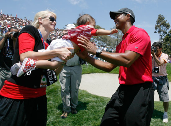 Tiger Woods, his daughter and his wife