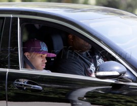 Chris Brown riding around Beverly Hills lookig sad (Mar. 18th 2009)