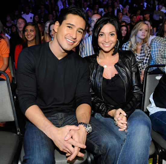 Mario Lopez and a gues the audience at a live taping of American Idol