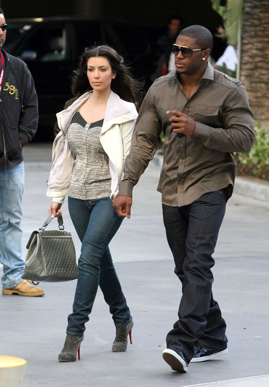 Reggie Bush & Kim Kardashian outside of the Staples Center at the Lakers/Nuggets game (May 27th 2009)