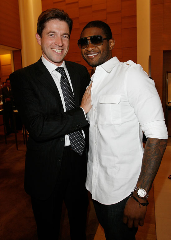 Usher & President/CEO of Cartier North America Frederic de Narp // 100th Anniversary In America Celebration at the Cartier Boutique