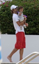 Gabriel Aubry and his daughter Nahla poolside in Miami (July 7th 2009)