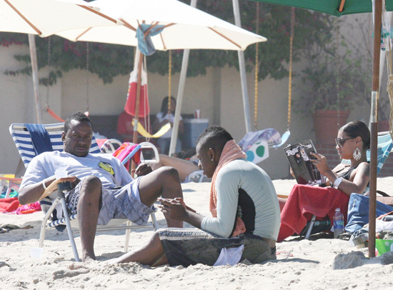 Bobby Brown and Alicia Etheridge on Malibu Beach (July 11th 2009)