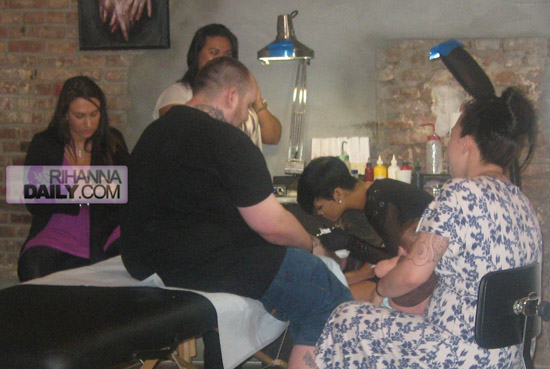 Rihanna taking tattoo lessons at East Side Ink in NYC (July 1st 2009)