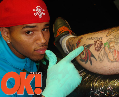 rihanna tattoos 2011. Chris Brown tattoos Bang Bang