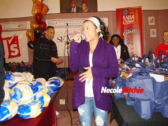 A pregnant Keyshia Cole speaks at Bethany Baptist Church in Cleveland