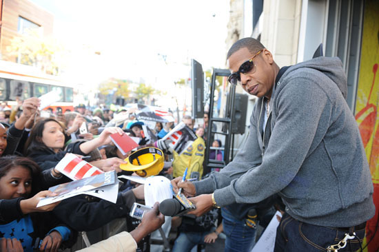 Jay-Z signing autographs for fans outside MuchMusic HQ in Toronto, Canada