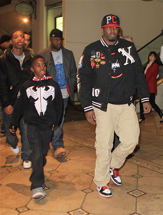 Diddy and his 11-year-old son Christian Combs leave a Hollywood movie theater - December 22nd 2009