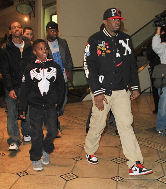 Diddy and his 11-year-old son Christian Combs leave a Hollywood movie theater - December 22nd 2009