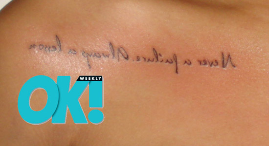 Rihanna's new "Never a failure, always a lesson." tatoo