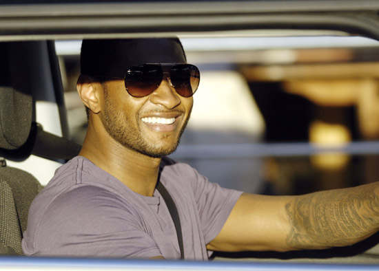 Usher spotted in traffic in St. Barth's sitting in his Mini Cooper - January 2nd 2010
