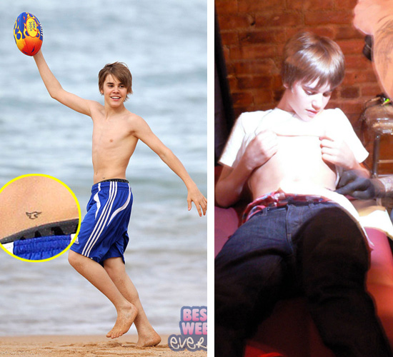 small star tattoo on hip. Pop star Justin Bieber just