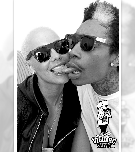 wiz khalifa and amber rose pics. Amber Rose is only famous