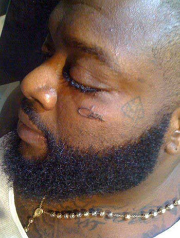 rick ross tattoos on face. Rick Ross has joined the likes