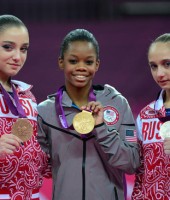 Gabby Douglas with Russian gymnasts Victoria Komova (R) and Aliya Mustafina (L) -- 2012 London Olympics