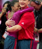 Gabby Douglas and coach Liang Chow celebrate her second gold medal win -- 2012 London Olympics