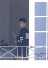 Rihanna spotted on her hotel balcony in Barbados (Dec 22 2012)