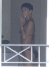 Rihanna spotted on her hotel balcony in Barbados (Dec 22 2012)