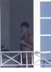 Rihanna spotted on her hotel balcony in Barbados (Dec 22 2012)