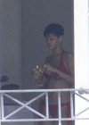 Rihanna spotted on her hotel balcony in Barbados (Dec 22 2012)