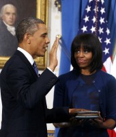 First Lady Michelle Obama shows off her new bangs