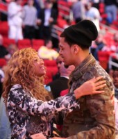 Beyonce and J. Cole at the 2013 NBA All-Star Game