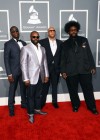 Musicians F. Knuckles, Black Thought, Kamal Gray and ?uestlove of "The Roots" on the red carpet at the 2013 Grammy Awards