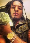 Young QC "Flexing" on Instagram/Facebook with the money he stole from his dead mother