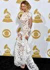 Beyoncé poses in a sexy white dress in the press room of the 2014 Grammy Awards