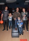 T.I. with all of his sons (L to R: Messiah, King, Major and Domani) at Messiah's 14th birthday bowling party