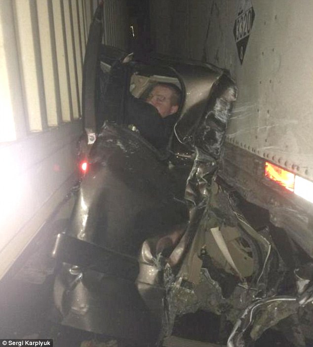 Kaleb Whitby pictured crushed between two semi trucks