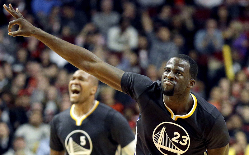 Golden State Warriors forward Draymond Green (23) celebrates after sinking a three point shot during the second half of an NBA basketball game against the Chicago Bulls in Chicago on Saturday, Dec. 6, 2014. The Warriors won 112-102. (AP Photo/Nam Y. Huh) ** Usable by LA, DC, CGT and CCT Only **