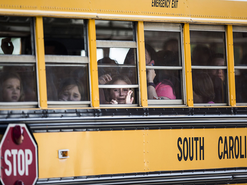 Townville elementary students pictured on a bus as they were transported to a nearby church to be picked up by their parents after the shooting.
