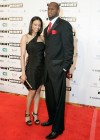 Vince Young and guest // 15th Annual Celebrity Fight Night