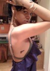 Rihanna’s new gun tattoos.