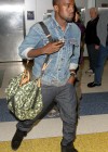Kanye West arriving at JFK airport in NYC (Apr. 20th 2009)
