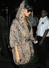 Rihanna (in the rain) outside her Manhattan hotel (June 18th 2009)