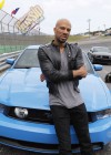 Common on the set of Queen Latifah’s “Fast Cars” music video