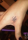 Khloe Kardashian’s new tattoo of her husband Lamar Odom’s initials – “LO”