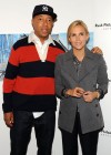 Russell Simmons & designer Tory Burch // Unveiling of the “Building Bounty-ful Bridges” National Arts Mural in New York City