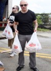 Pitbull delivering Turkeys in Miami
