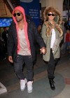 Kanye West & Amber Rose leaving a movie theater in Hollywood after watching “Sherlock Holmes”
