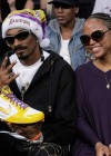 Snoop Dogg & his wife Shante Broadus // Los Angeles Lakers vs. Cleveland Cavaliers basketball game in LA – December 25th 2009