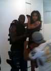 Chad Ochocinco and Nicole “Hoopz” Alexander on the set of a photoshoot for Urban Ink Magazine