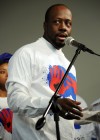Wyclef Jean promoting Haiti earthquake relief efforts in Harlem, New York City