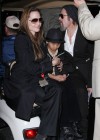 Angelina Jolie and Brad Pitt with their son Maddox // Super Bowl XLIV